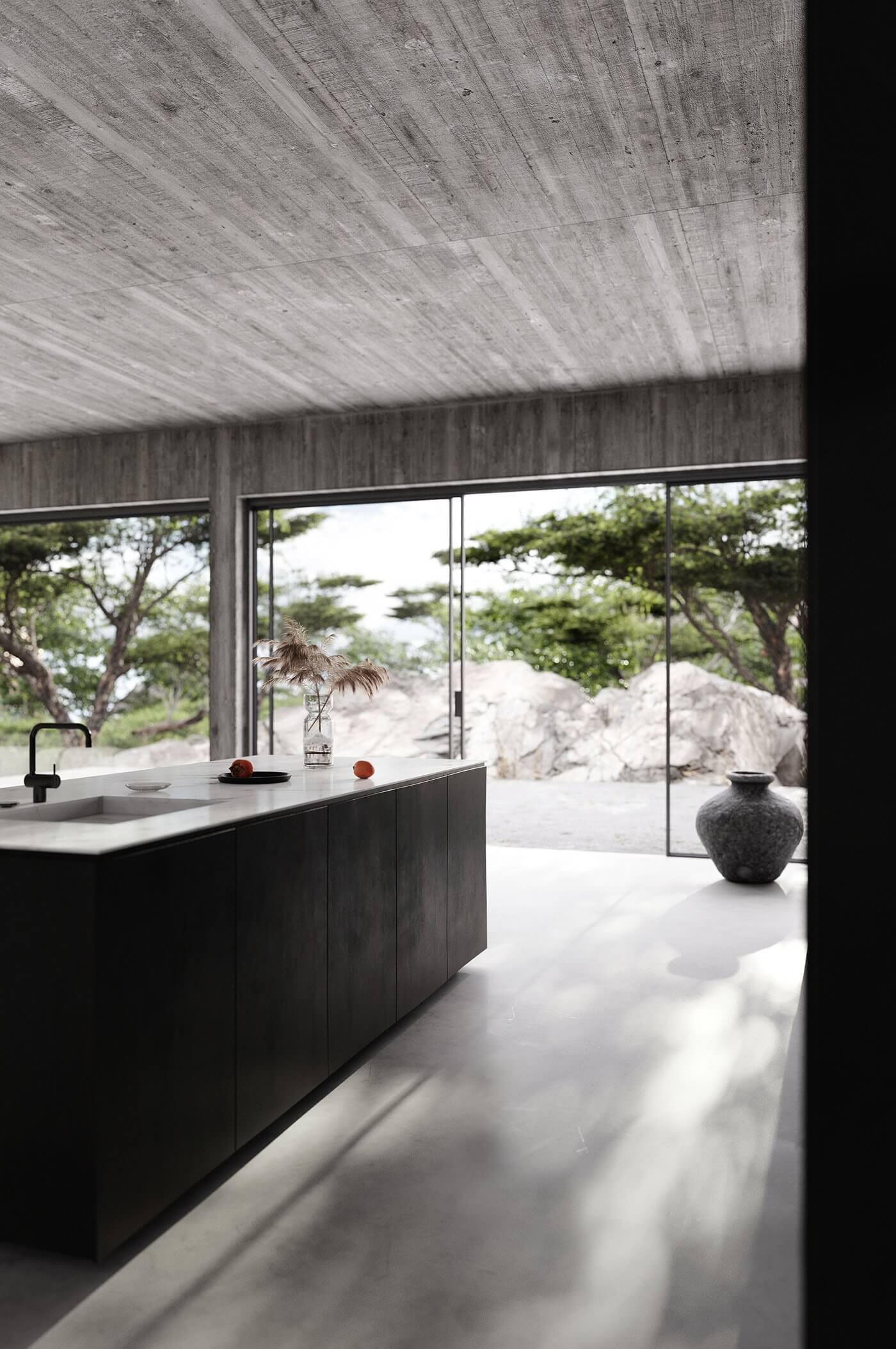 In praise of shadows house kitchen block design marble dark wood - cgi visualizations